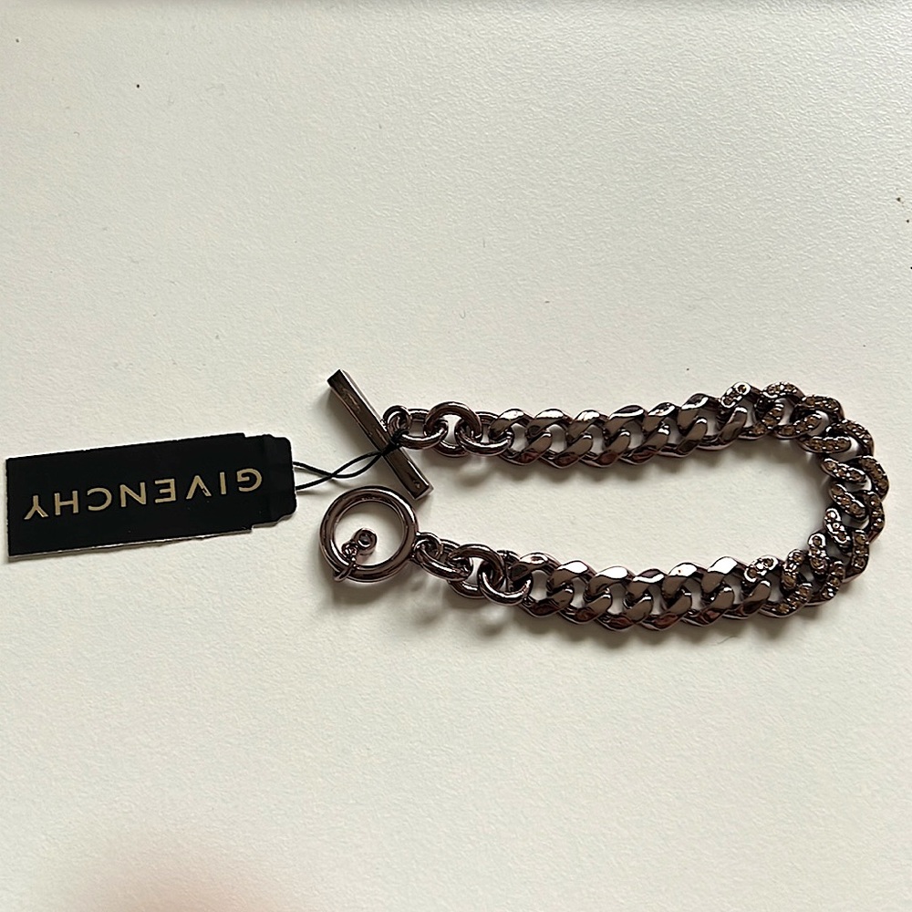 Givenchy bracelet rhinestones with nickel metal.  approx 7.25”